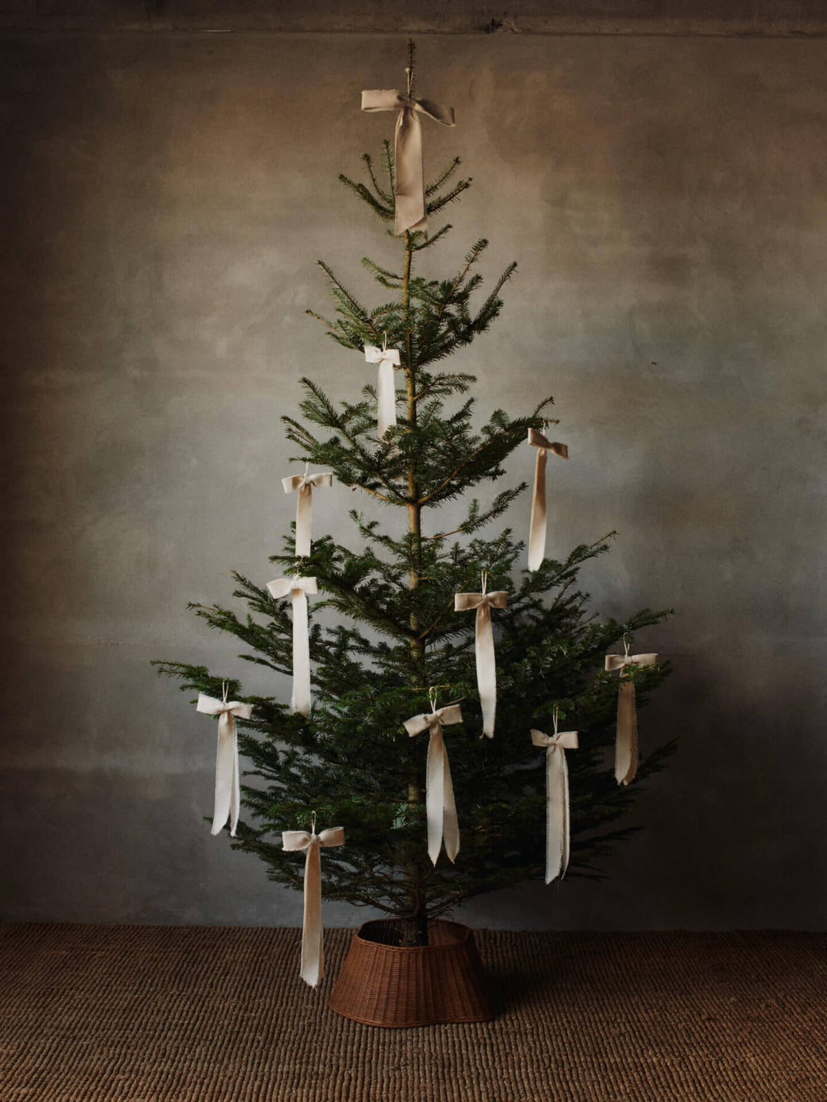 Cubrepié de árbol trenzado Drape · Ferm Living · ambiente