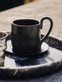 Taza con platillo Flow de Ferm Living