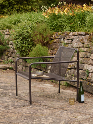 Butaca con brazos de exterior Dapple de Ferm Living