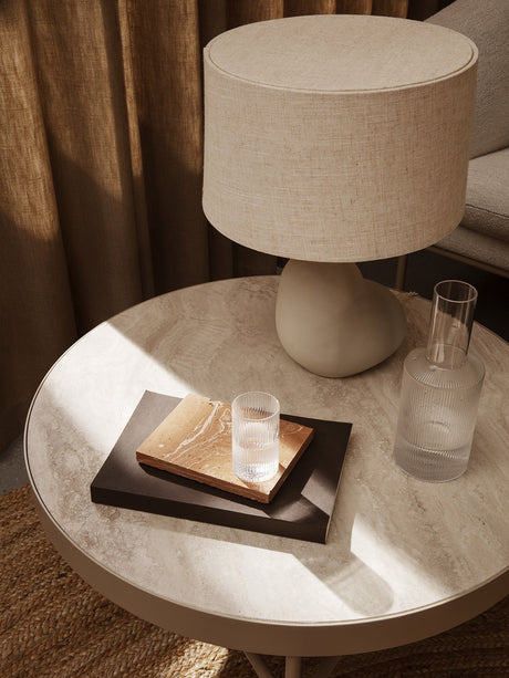 Mesa de travertino Travertine de Ferm Living